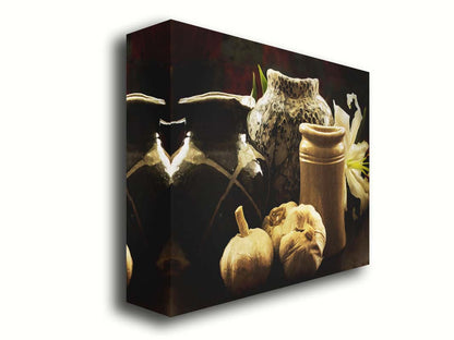 A photo of a still life arrangement of pottery and plants with a dark, warm palette. Printed on canvas.