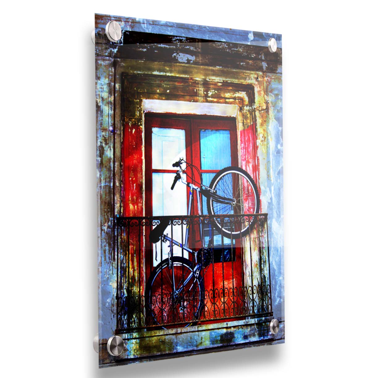 A photo of a bike propped up on a balcony in front of a red door. Printed on acrylic.