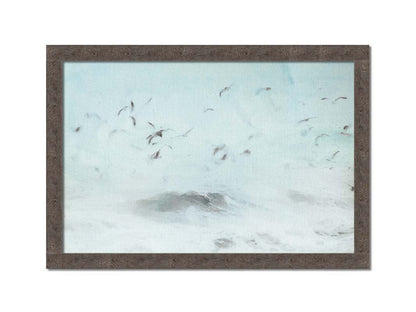 A photo edit of birds flying low over the stormy ocean, searching for a meal. Printed on canvas and framed.