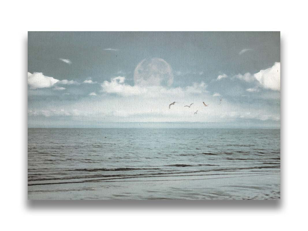 A photo of a pale blue sea with a lage moon on the horizon. Printed on canvas.