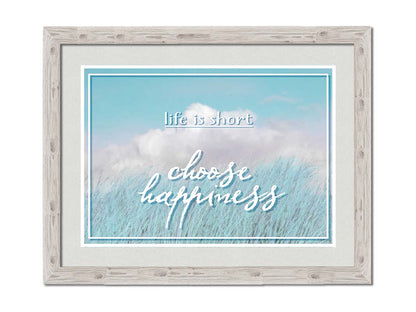 A photo of tall grass under a blue sky with white clouds. The phrase "Life is short, choose happiness" is superimposed on the image. Printed on paper, matted, and framed.