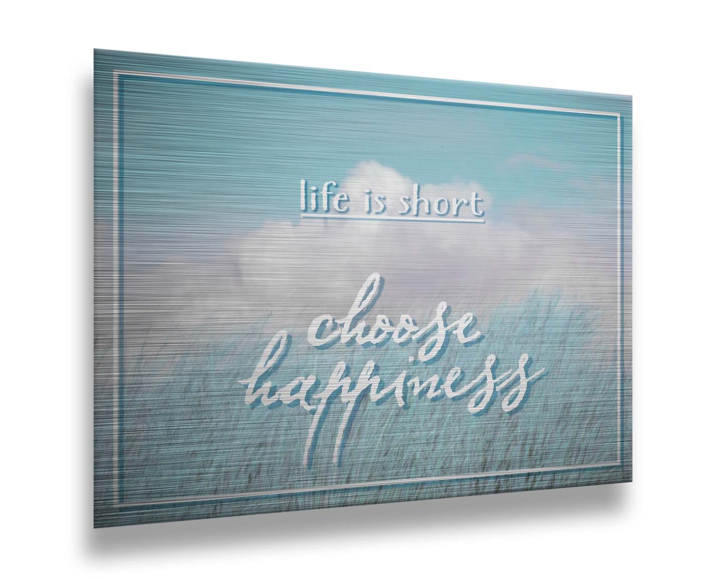 A photo of tall grass under a blue sky with white clouds. The phrase "Life is short, choose happiness" is superimposed on the image. Printed on metal.