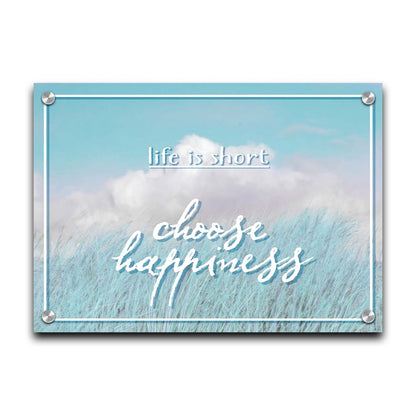 A photo of tall grass under a blue sky with white clouds. The phrase "Life is short, choose happiness" is superimposed on the image. Printed on acrylic.