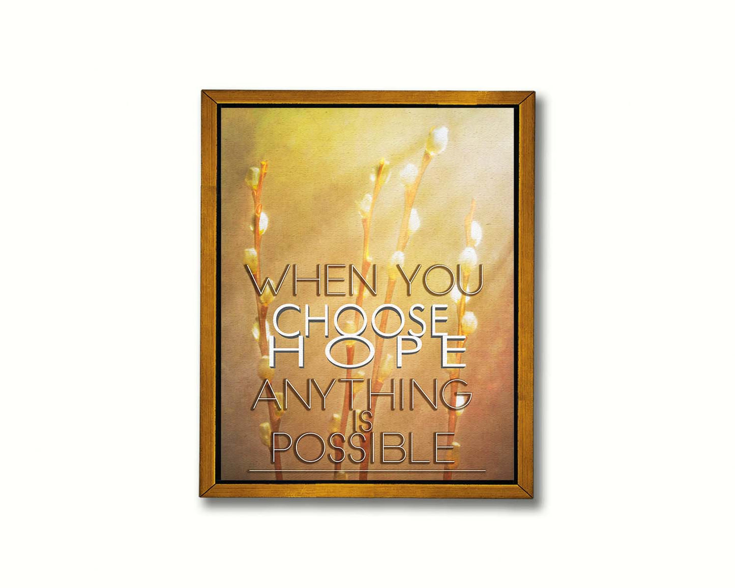 A photo of four stems of plant buds bathed in golden light. The phrase "When you choose hope, anything is possible" is superimposed on the center. Printed on canvas in a float frame.