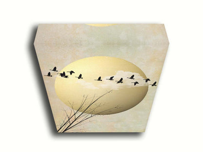 A photo collage art piece of migratory birds flying south for the winter, silhouetted against a big gold moon. Printed on canvas.