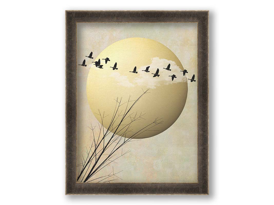 A photo collage art piece of migratory birds flying south for the winter, silhouetted against a big gold moon. Printed on canvas and framed.