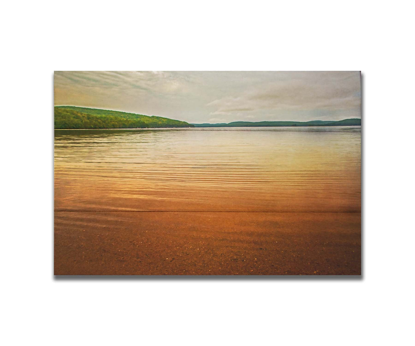 A painting of the orange sunlight reflecting off the ocean. Printed on a box board.