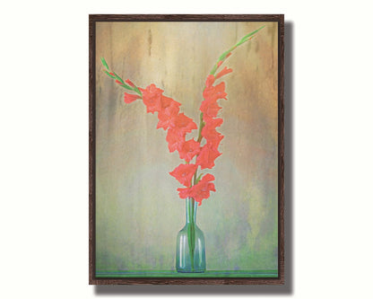 A photo of two red gladiolus flower spikes in a small blue vase. Printed on canvas in a float frame.