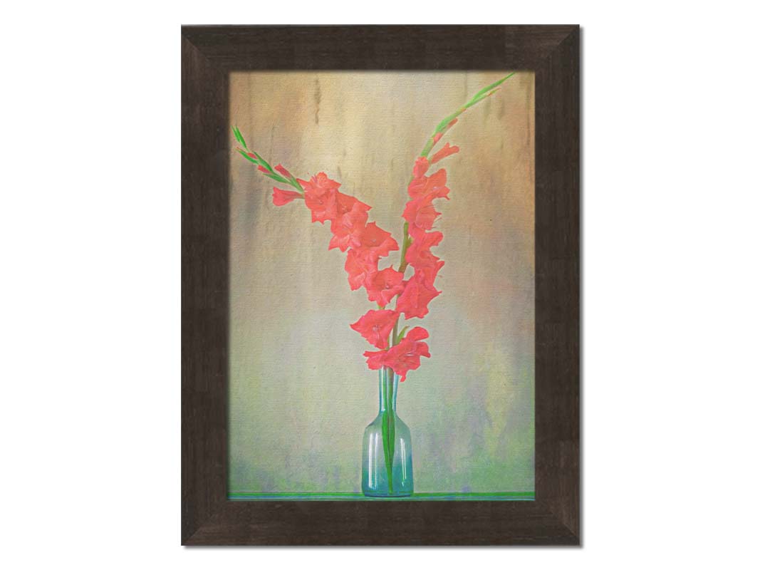 A photo of two red gladiolus flower spikes in a small blue vase. Printed on canvas and framed.