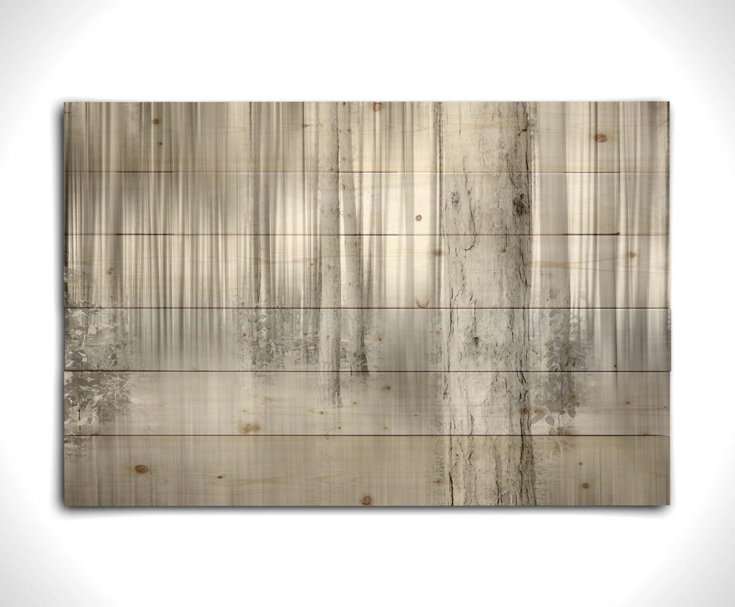 A grayscale photo of a forest of tree trunks, edited with a dramy blur that emphasizes the verticality of the trees. Printed on a wood pallet.