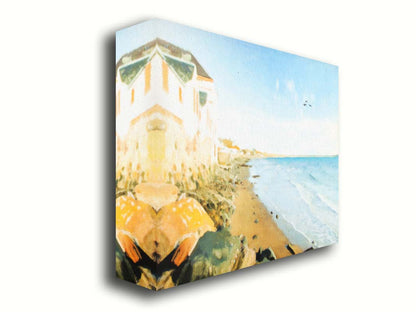 A photo of a beach lined with houses on a calm, sunny day.  Printed on canvas.