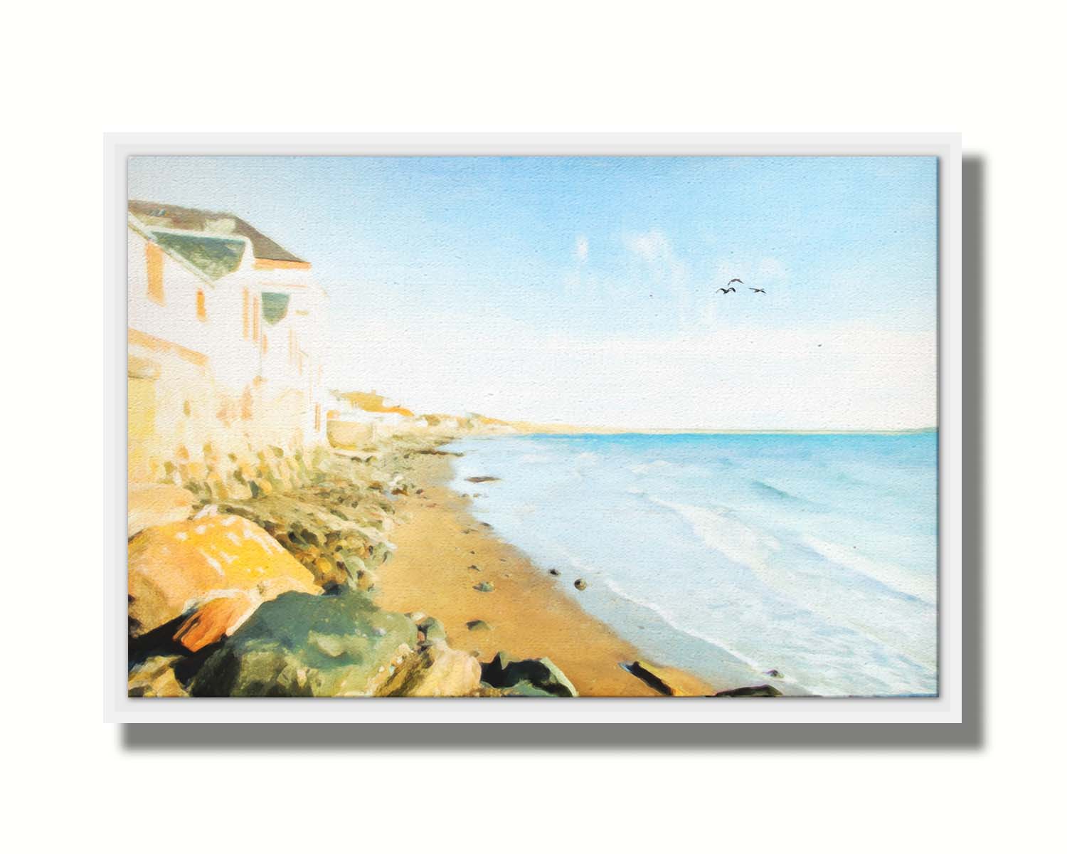 A photo of a beach lined with houses on a calm, sunny day.  Printed on canvas in a float frame.