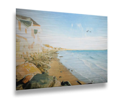 A photo of a beach lined with houses on a calm, sunny day.  Printed on metal.