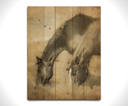 A sepia photo of two horses grazing, overlayed with weathered and stained textures. Printed on a wood pallet.