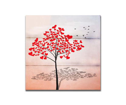 A graphic of a tree with red heart icons for leaves against a white and pink background. Printed on a box board.