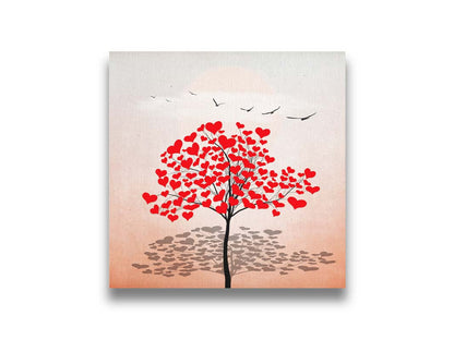 A graphic art piece of a tree with red hearts for leaves against a pink and white background, as birds fly overhead. Printed on canvas.