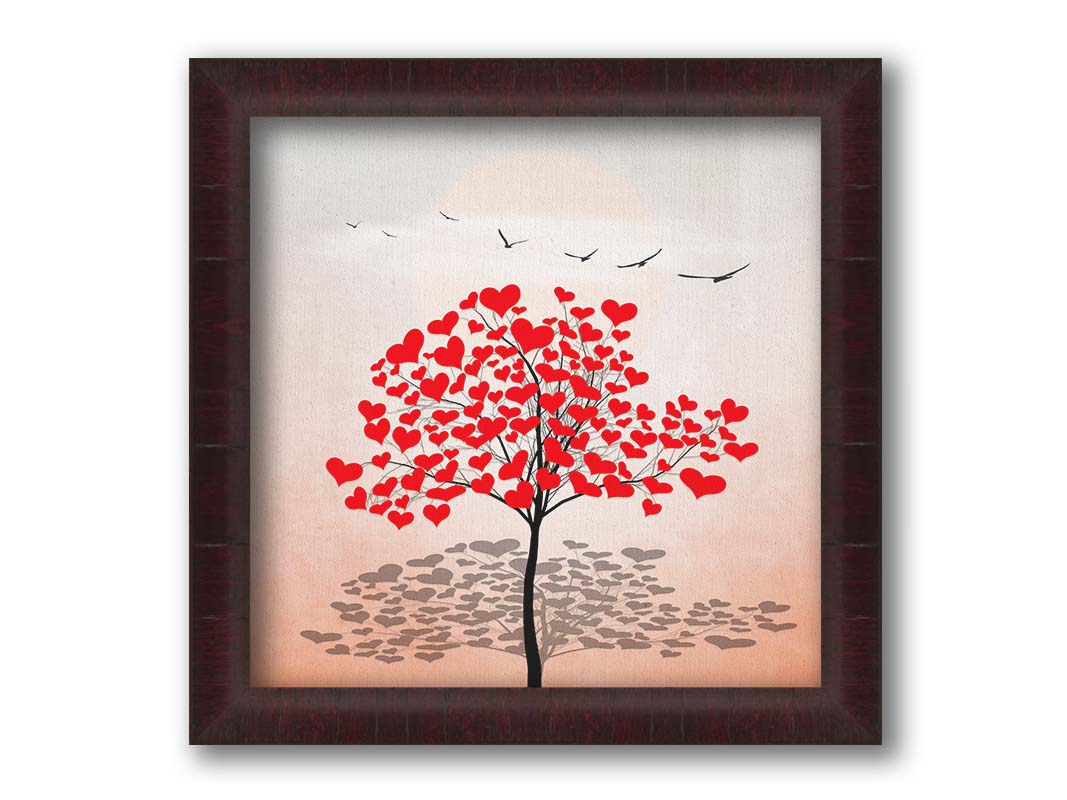 A graphic art piece of a tree with red hearts for leaves against a pink and white background, as birds fly overhead. Printed on canvas and framed.