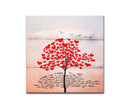 A graphic art piece of a tree with red hearts for leaves against a pink and white background, as birds fly overhead. Printed on a box board.