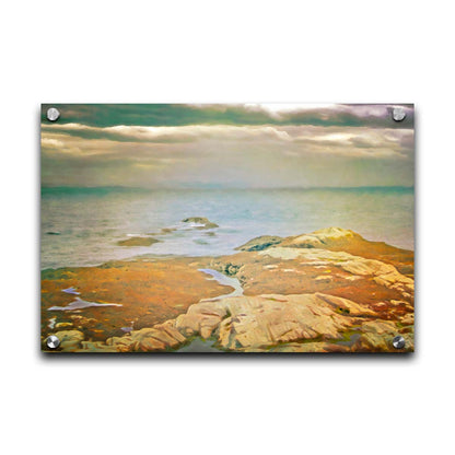 A photo of a stoney shore, looking out to sea under a cloudy sky. Printed on acrylic.