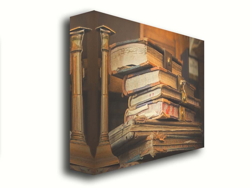 A photo of a stack of worn books, many bound shut by brassy locks. Printed on canvas.