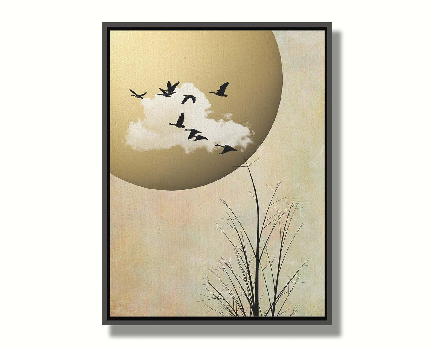 A photo collage art piece of migratory birds flying south for the winter, silhouetted against a big gold moon. Printed on canvas in a float frame.