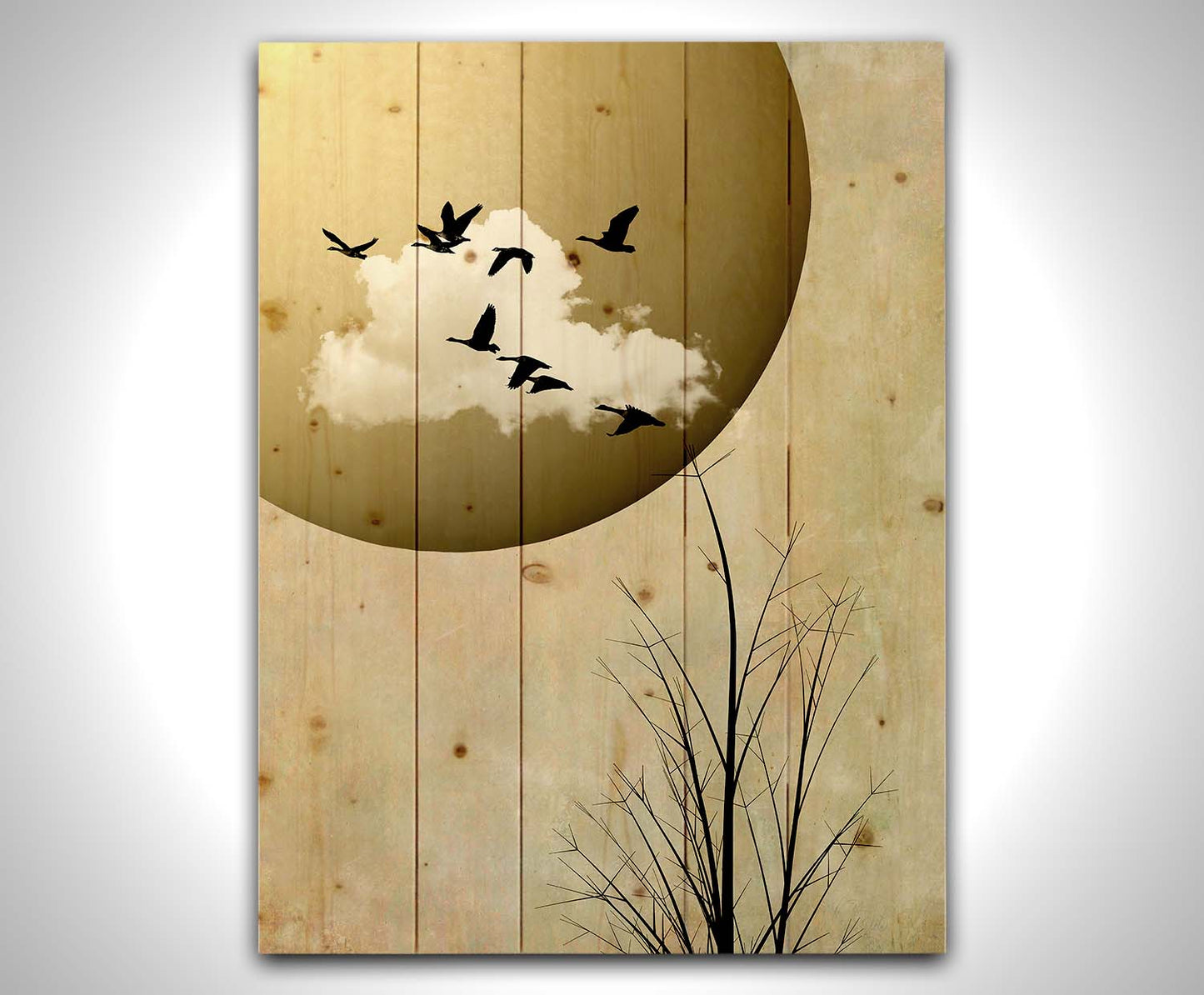 A photo collage art piece of migratory birds flying south for the winter, silhouetted against a big gold moon. Printed on a wood pallet.