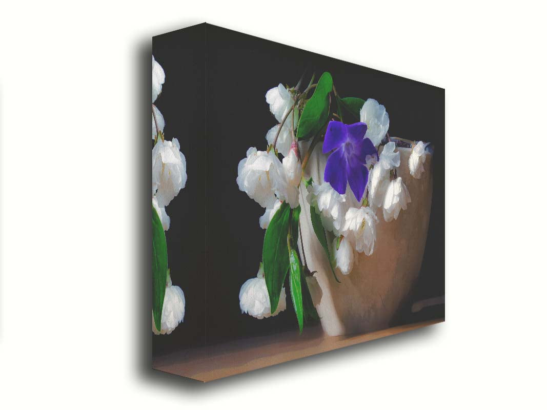 A photo of a brown bowl of white and purple flowers, edited to have a painterly quality. Printed on canvas.