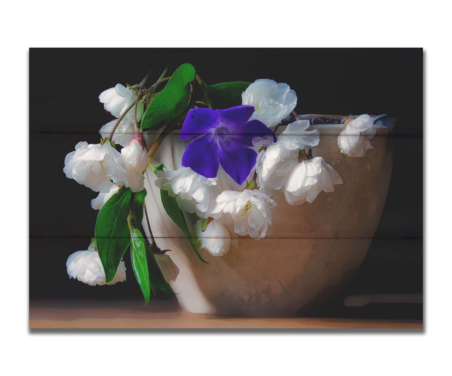 A photo of a brown bowl of white and purple flowers, edited to have a painterly quality. Printed on a box board.