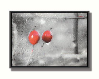 A photo of two red berries, covered in water from the rain, in grayscale with red spot color. It is overlayed with a texture of wet glass. Printed on canvas in a float frame.