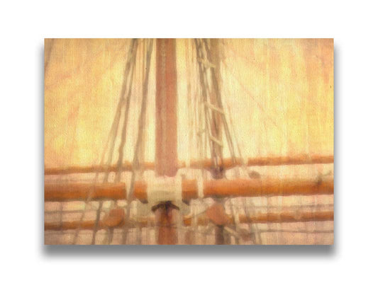 A photo of a ship's rigging against a yellow and orange sky. Printed on canvas.