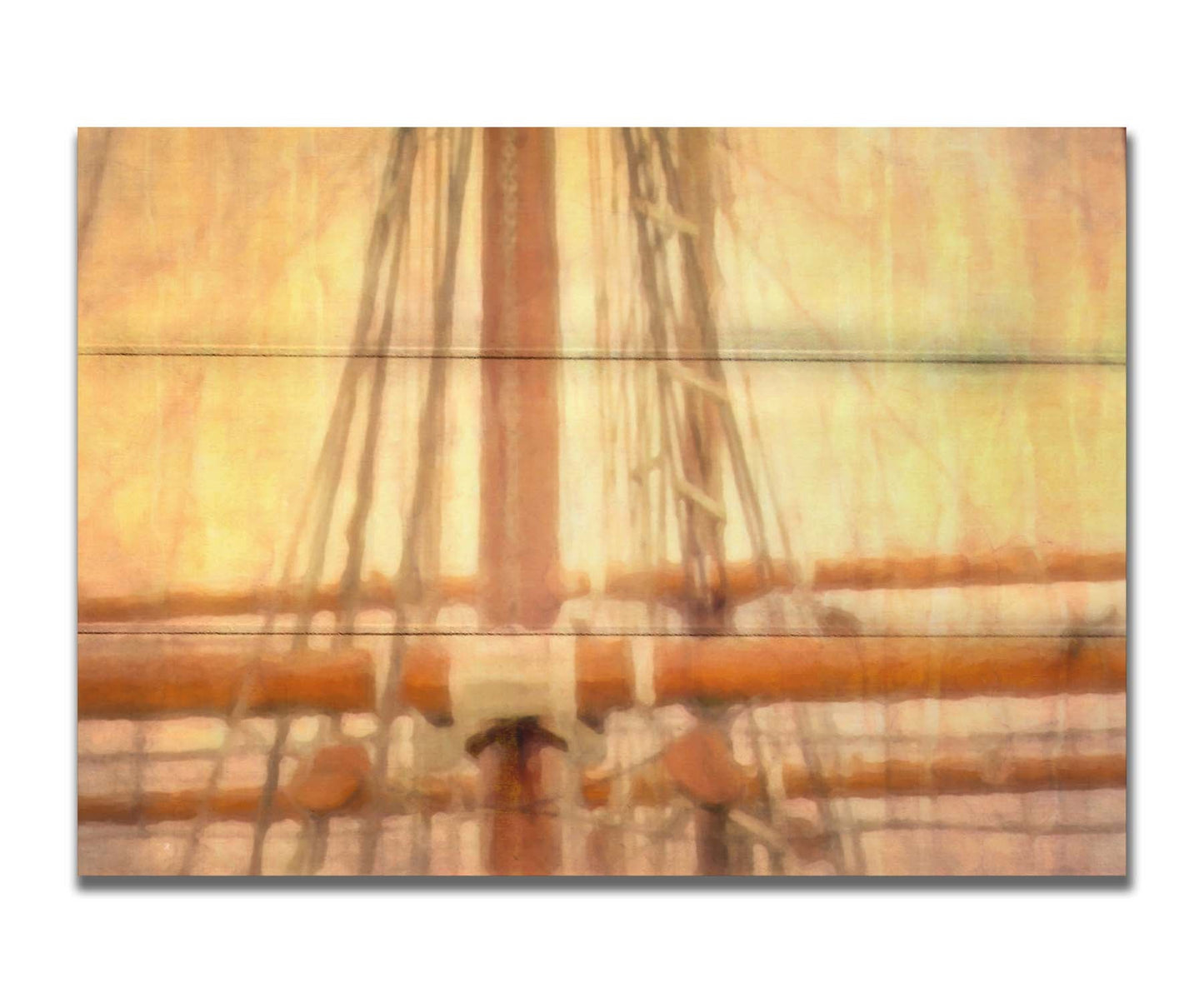 A photo of a ship's rigging against a yellow and orange sky. Printed on a box board.