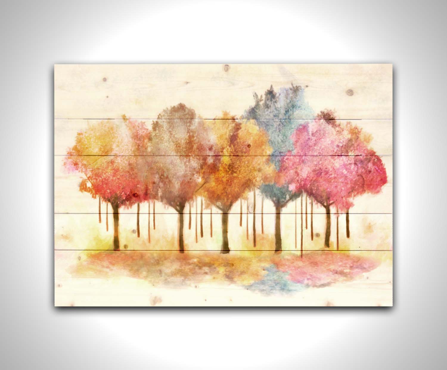 A watercolor-like photo composition depicting a grove of trees in a pink, blue, and orange color pallete. Printed on a wood pallet.