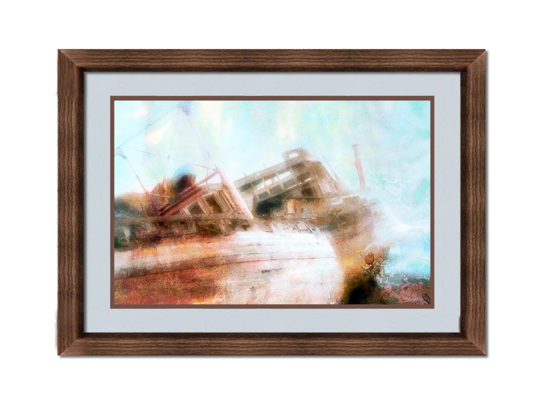 A photo of an old, shipwrecked boat on the beach. Printed on paper, matted, and framed.