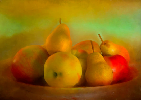 A photo of a dish of apples and pears, in a greenish yellow light. 