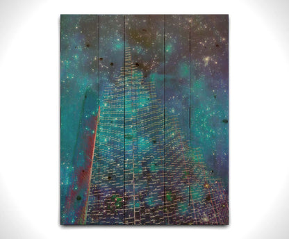 A photo edit combining a skyscraper cityscape with a sky view of space. The lights of the building outlines and windows meld into the lights of the stars. Printed on a wood pallet.