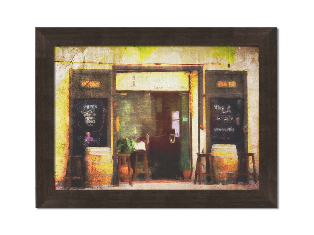 A photo of a rustic restaurant storefront, with barrels outside used as tables. It is edited to have a weathered texture. Printed on canvas and framed.