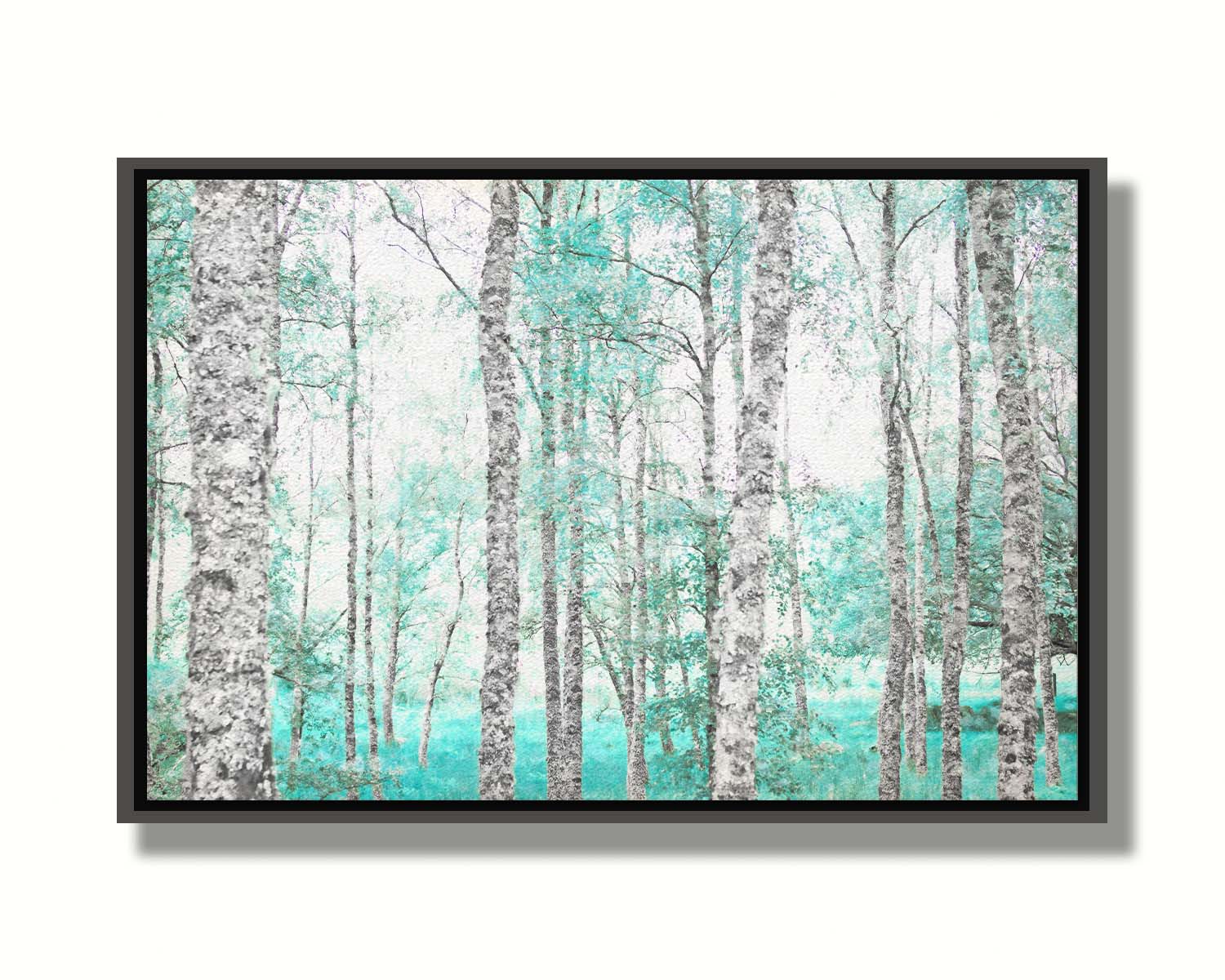 A photograph of a forest of rough trees, edited in grayscale with selective areas of vibrant blue teal on the leaves and grass. Printed on canvas in a float frame.