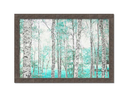 A photograph of a forest of rough trees, edited in grayscale with selective areas of vibrant blue teal on the leaves and grass. Printed on canvas and framed.