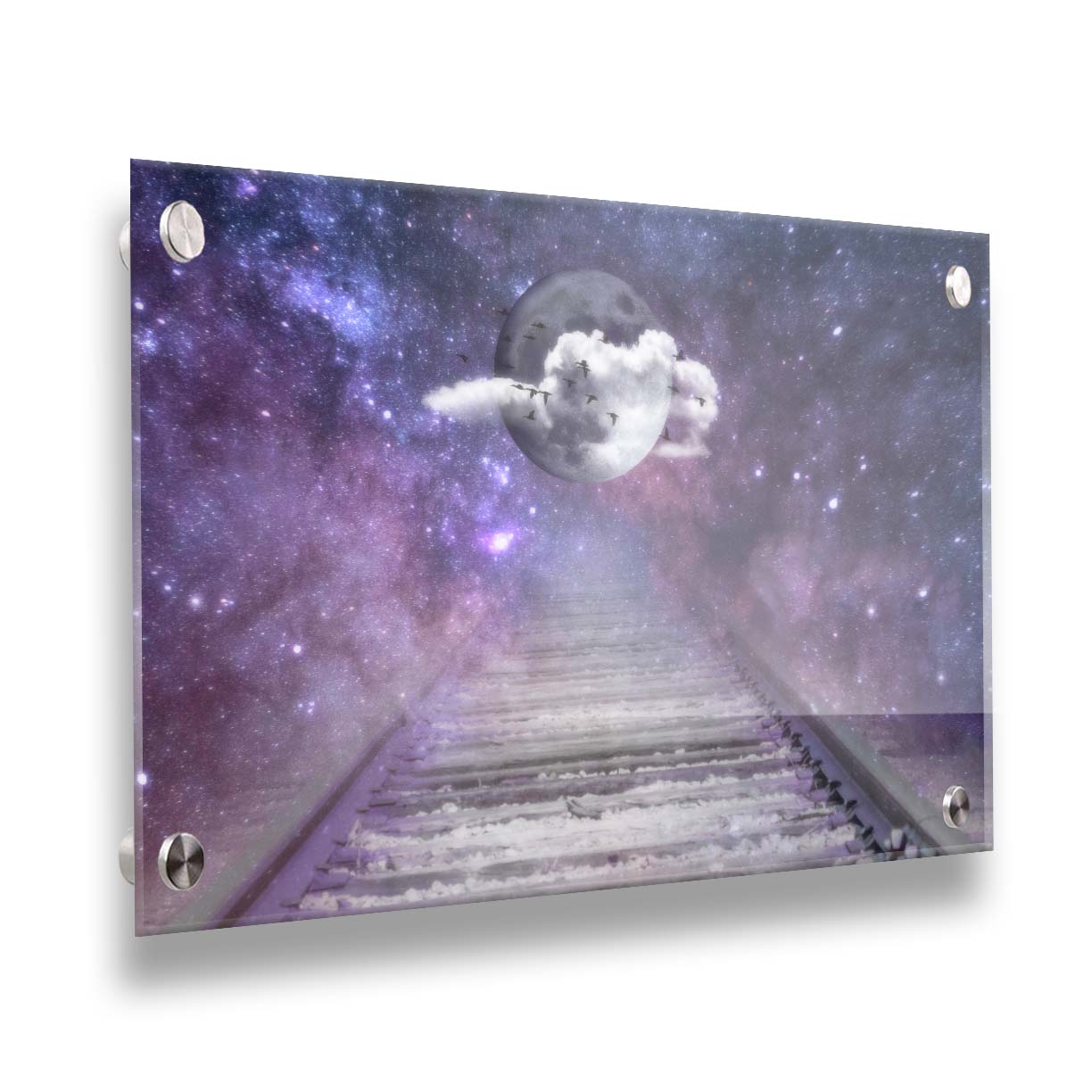 An edited photo looking down train tracks, leading into a starry space view. In the center is a moon surrounded by wispy clouds, with silhouetted geese flying across it. Printed on acrylic.