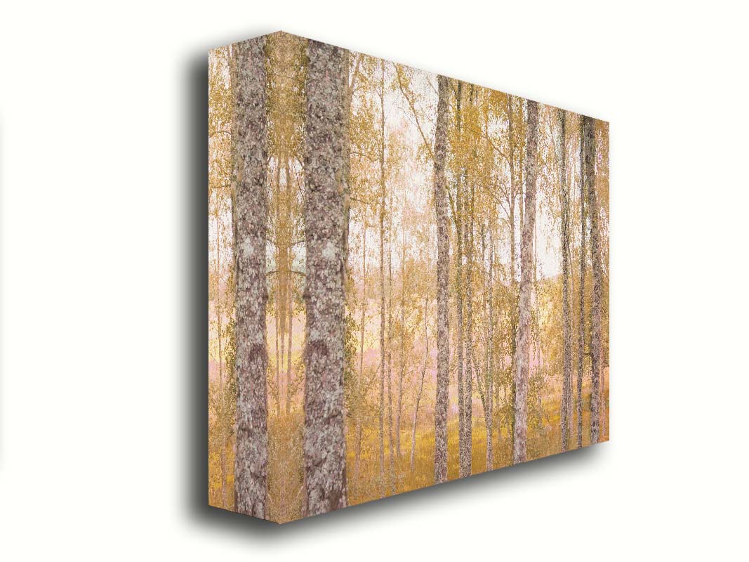 A landscape photo of a forest of yellow autumn trees, edited to be reminiscent of pointilism. Printed on canvas.