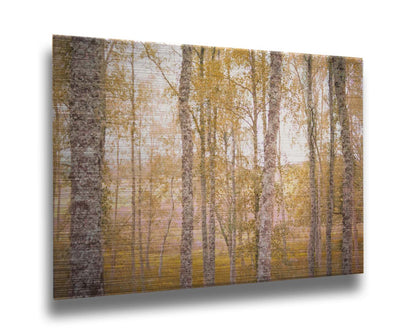 A landscape photo of a forest of yellow autumn trees, edited to be reminiscent of pointilism. Printed on metal.