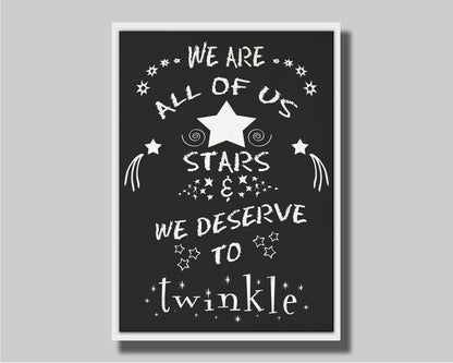 A typography design reading "We are all of us stars and we deserve to twinkle" in white on a black background. Printed on canvas in a float frame.