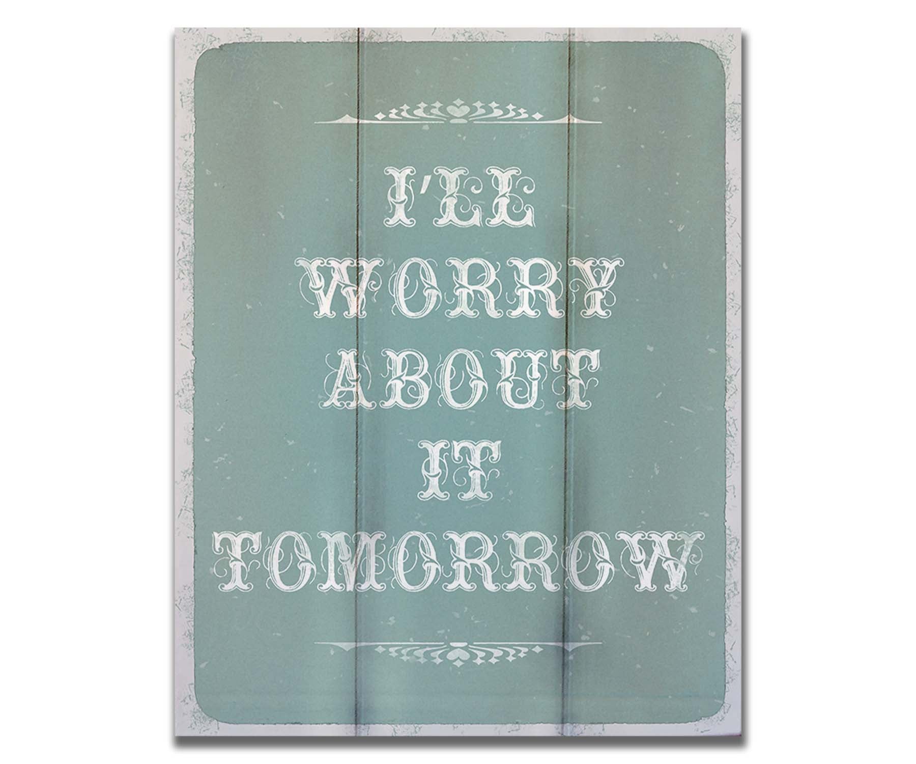 A typography design reading "I'll worry about it tomorrow" in white on a pale blue background. Printed on a box board.