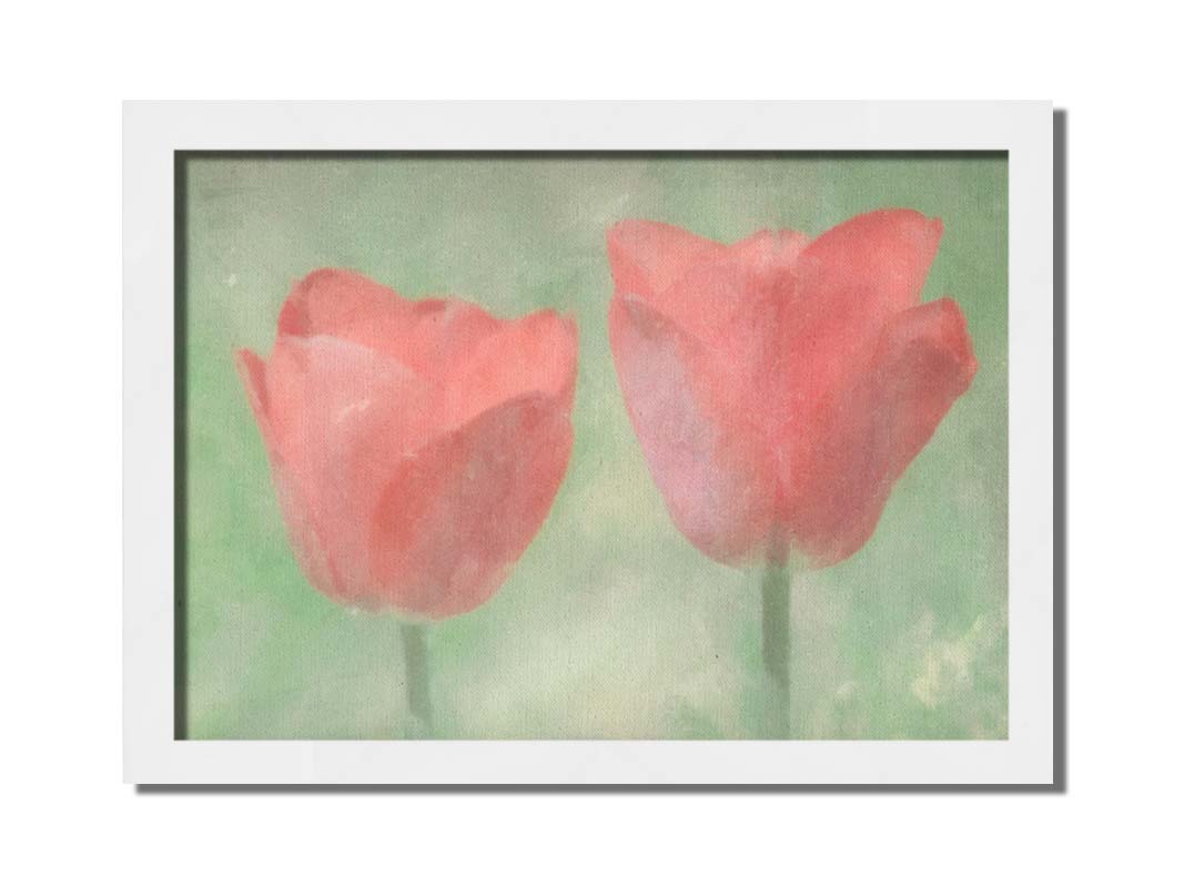 A photo of two red tulips against a green background, edited with dusty worn overlays. Printed on canvas and framed.