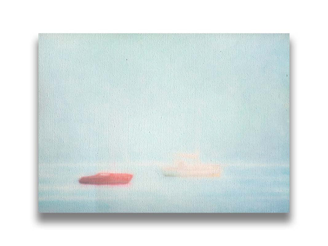 A photo of a small red boat and a small white and yellow boat floating at sea. The photo is edited to have a soft, blurry quality which blends the sky and sea together on the horizon. Printed on canvas.