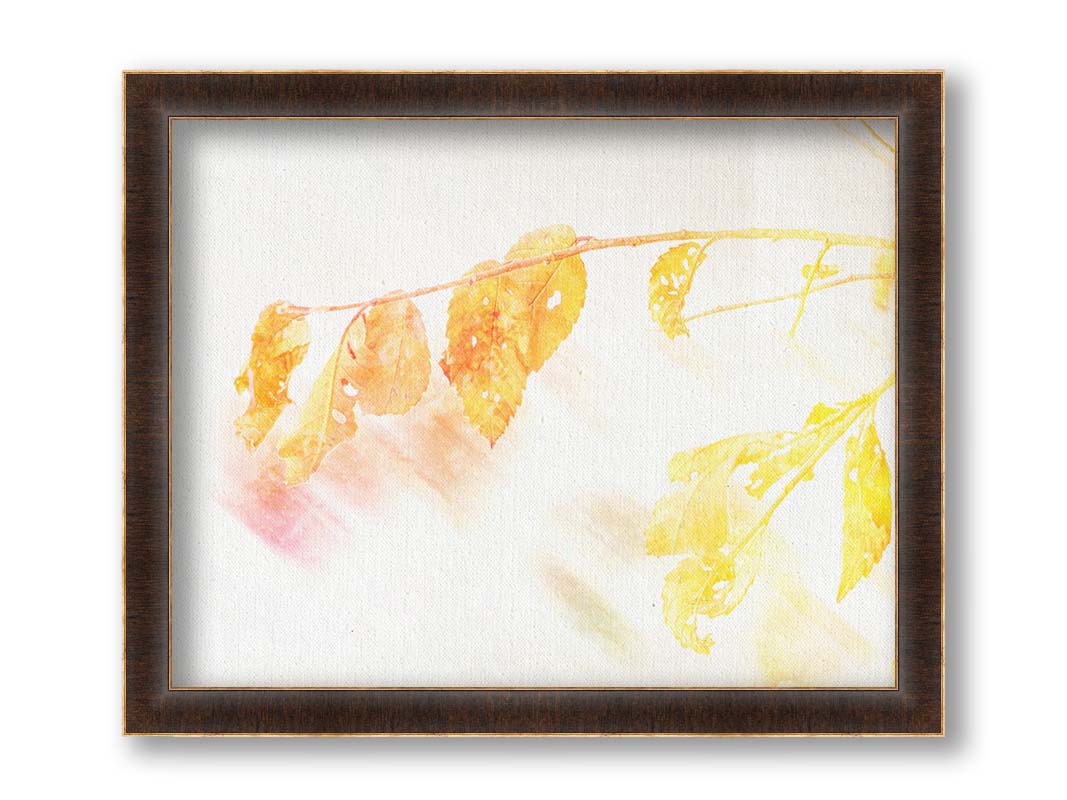 A still life photo of a stem of orange and yellow leaves aglow before a stark white background. Printed on canvas and framed.