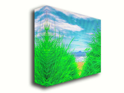 A photograph, edited to increase saturation, looking out at the sea between grassy plants on the beach. A rocky outcropping can be seen in the distance. Printed on canvas.