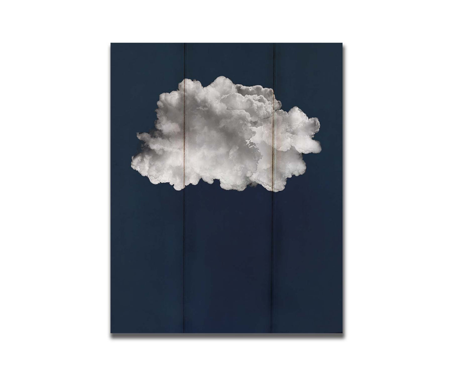 A photo edit of a large, fluffy white cloud against a deep blue background. Printed on a box board.