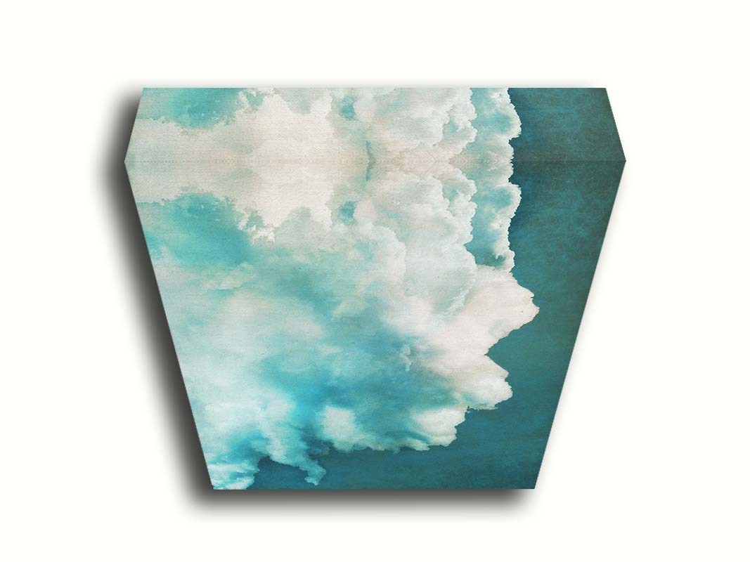 A photograph of a big white cloud with a teal background. Printed on canvas.