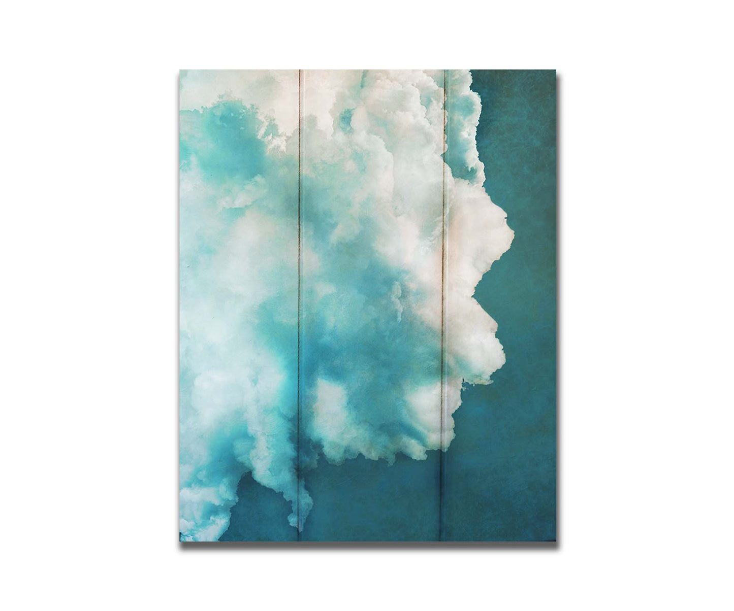 A photograph of a big white cloud with a teal background. Printed on a box board.